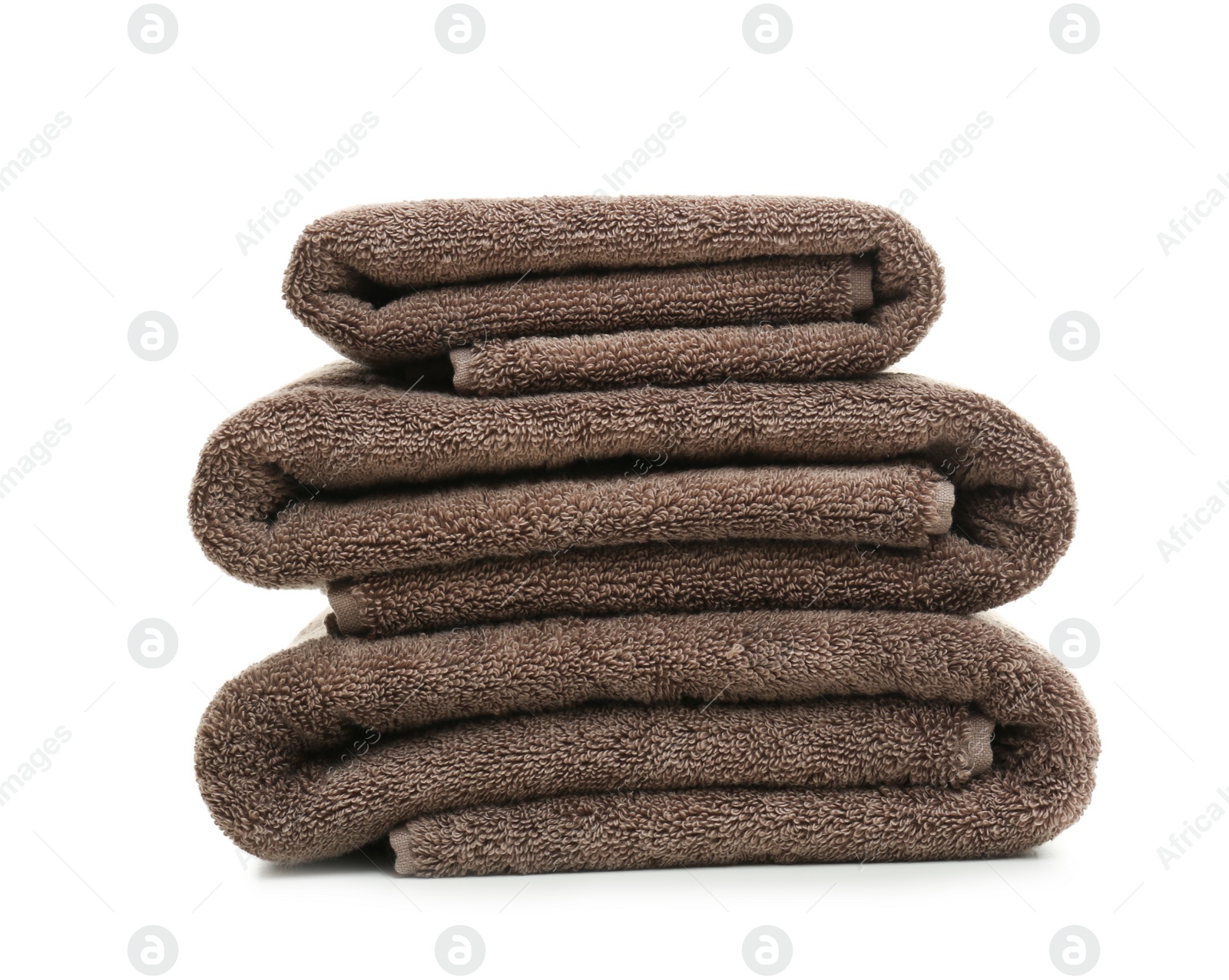 Photo of Stack of clean folded towels on white background