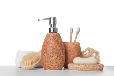 Photo of Bath accessories. Different personal care products on table against white background