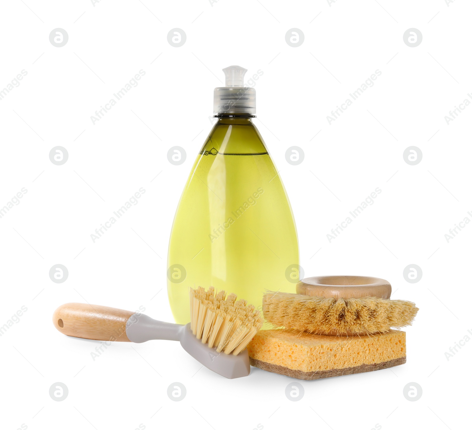 Photo of Bottle of cleaning product, brushes and sponge isolated on white