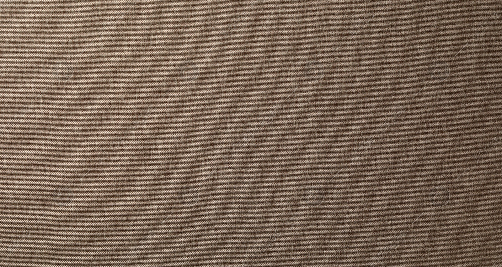 Photo of Texture of brown fabric as background, top view