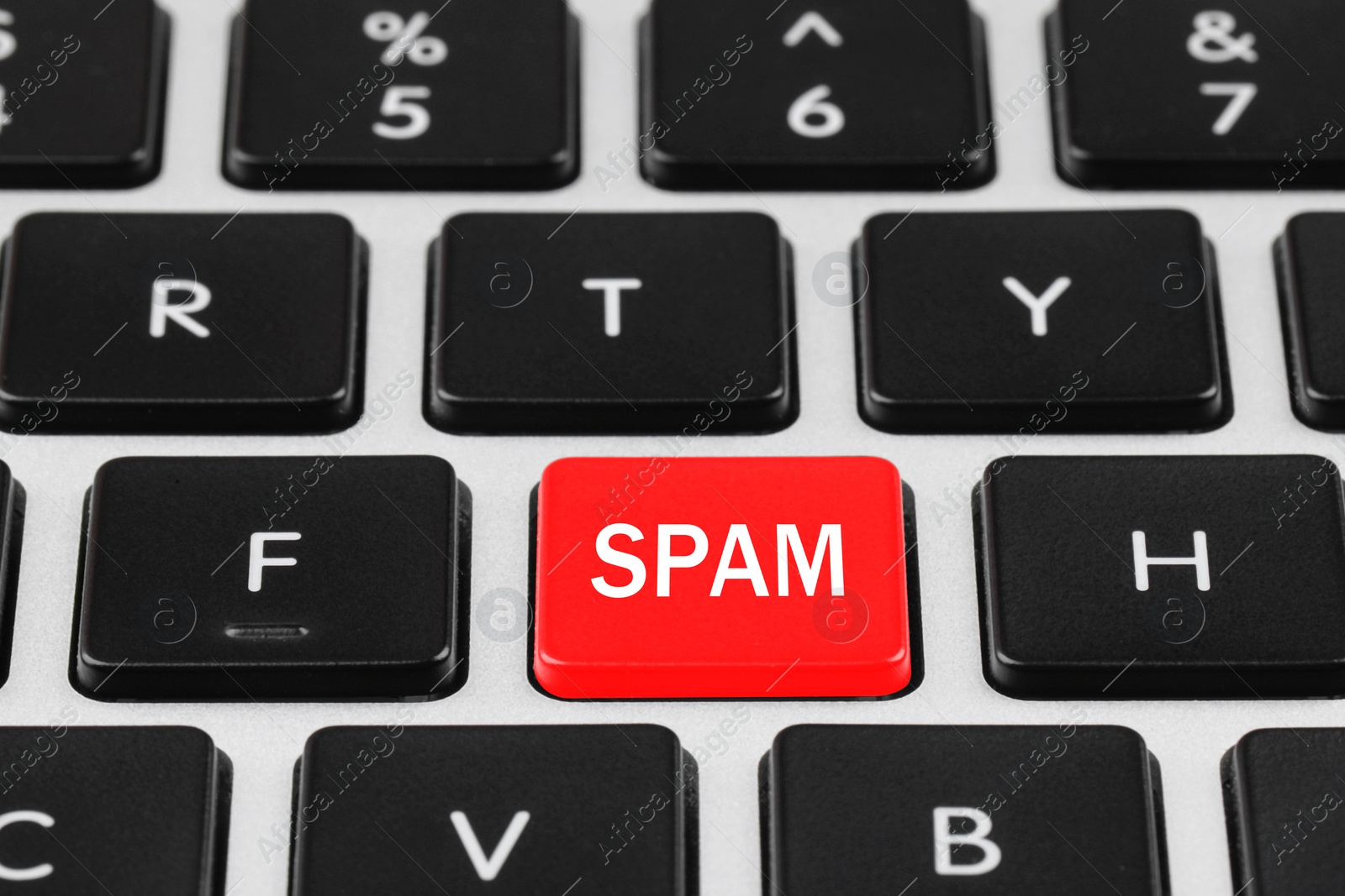 Image of Red button with word Spam on computer keyboard, closeup