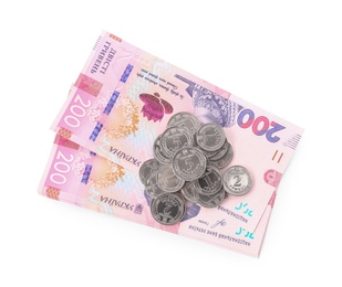 Photo of Ukrainian money on white background, top view
