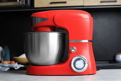 Modern stand mixer on table in kitchen