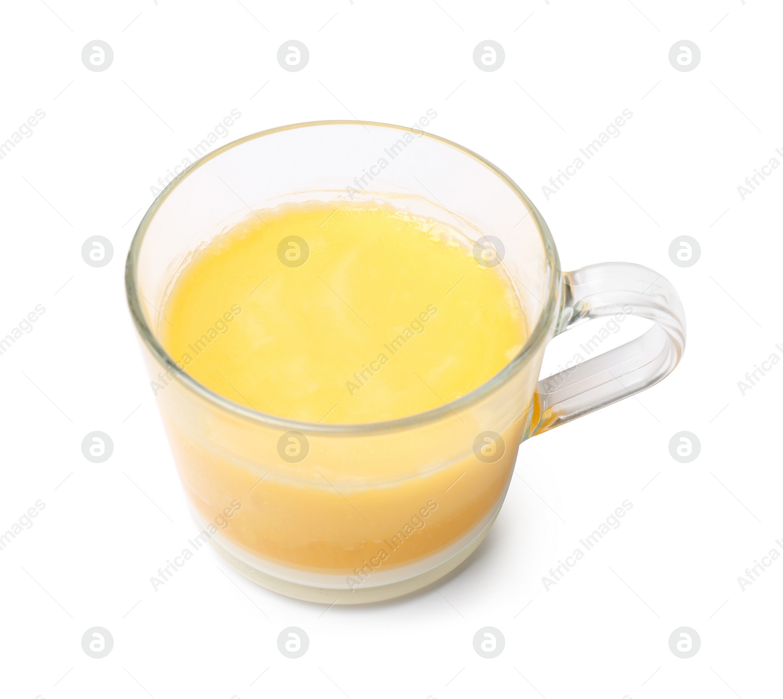 Photo of Glass cup with clarified butter on white background