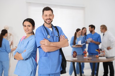Portrait of medical students wearing uniforms in university