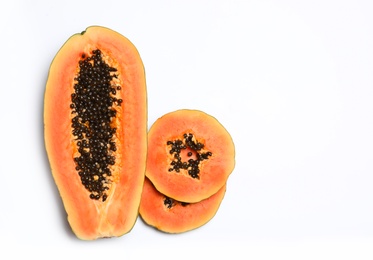 Fresh juicy cut papaya on white background, top view