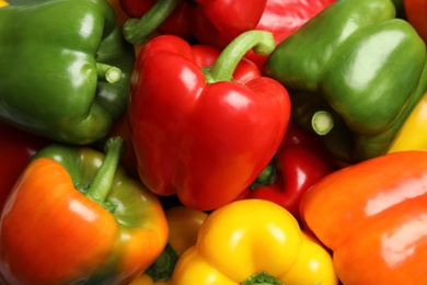 Photo of Colorful paprika peppers as background, closeup