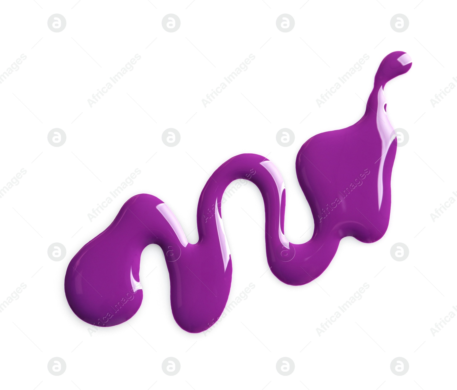 Photo of Spilled bright nail polish on white background, top view