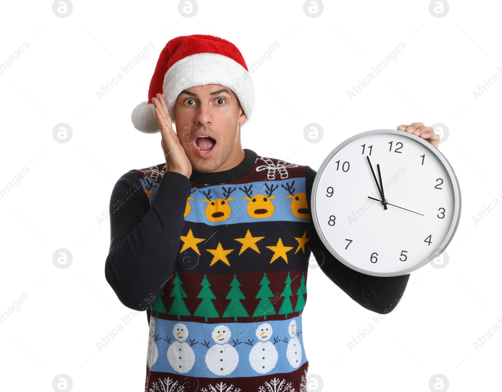 Photo of Man in Santa hat with clock on white background. Christmas countdown
