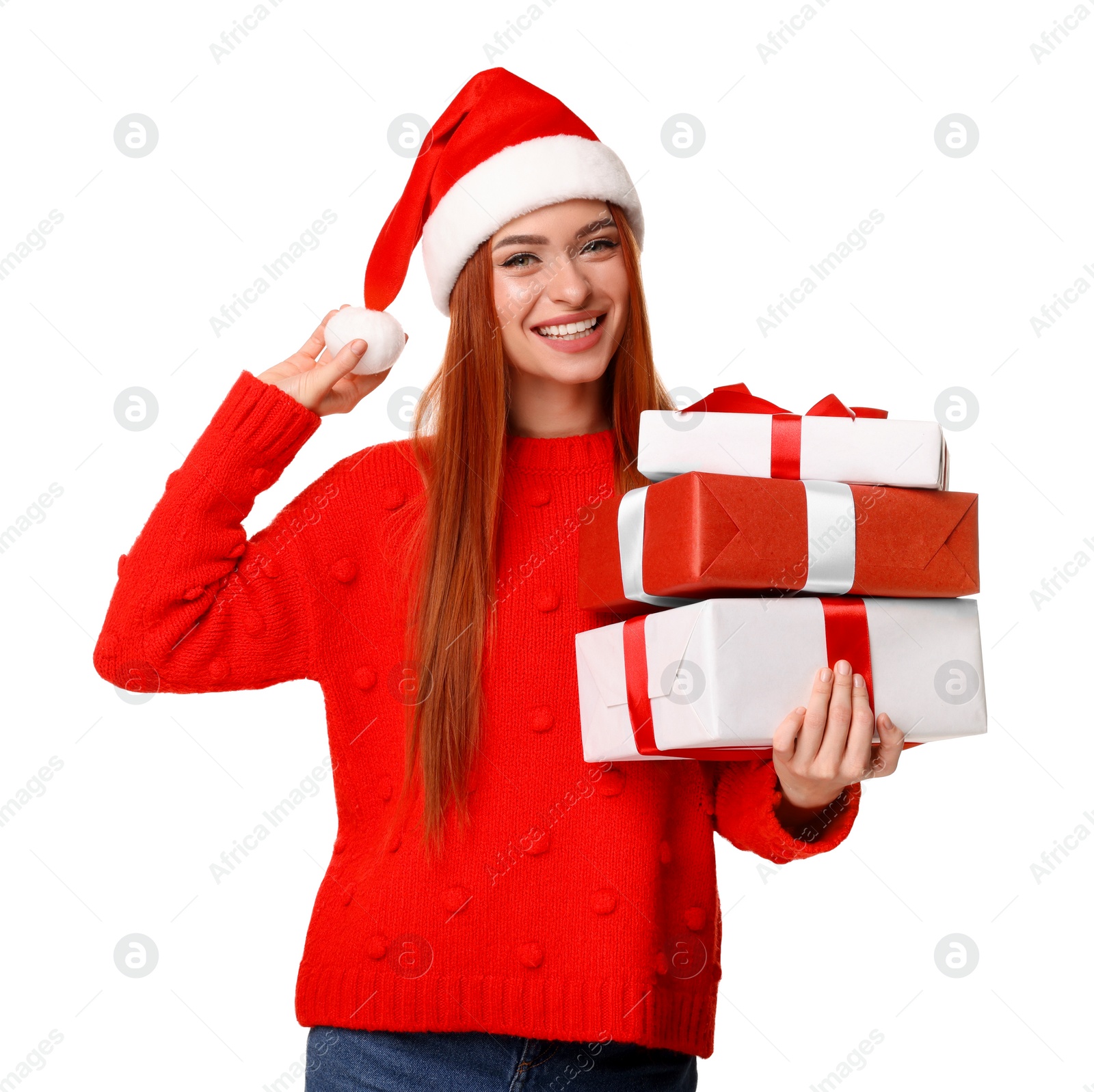 Photo of Young woman in red sweater and Santa hat with Christmas gifts on white background