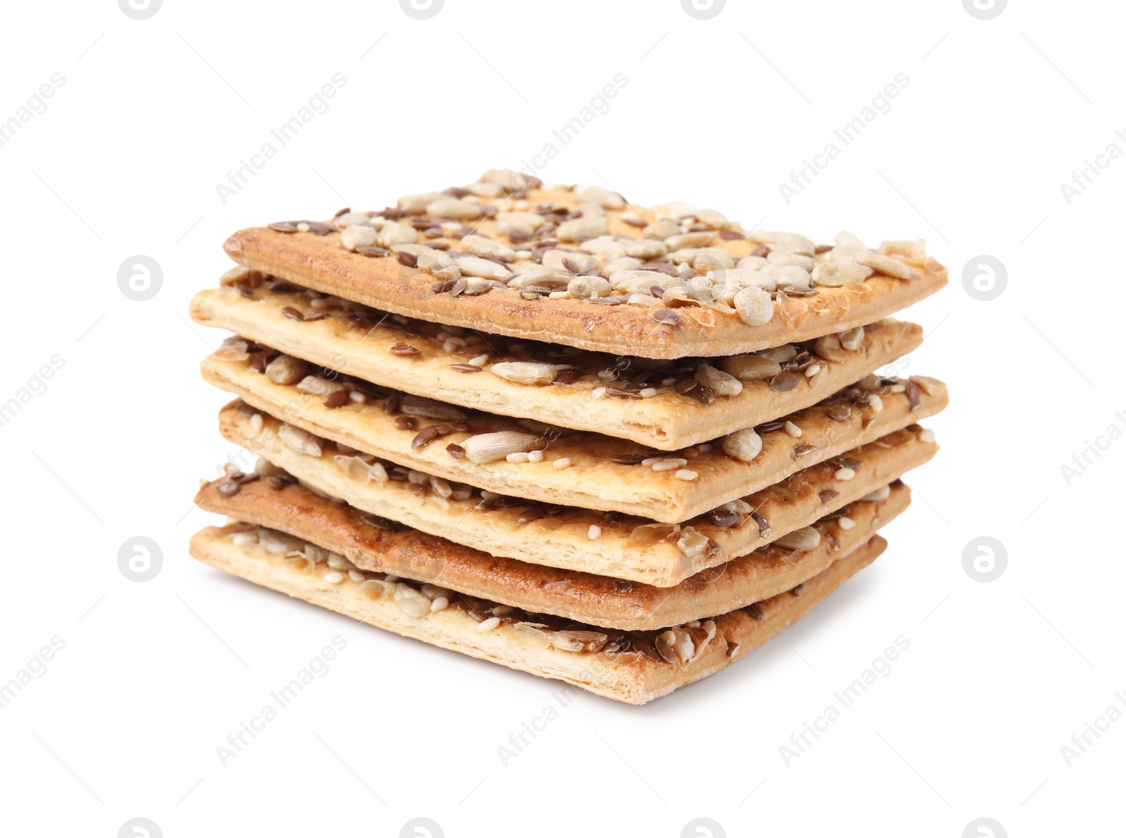 Photo of Stack of cereal crackers with flax, sunflower and sesame seeds isolated on white