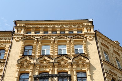 Photo of Beautiful facade of building on sunny day, low angle view