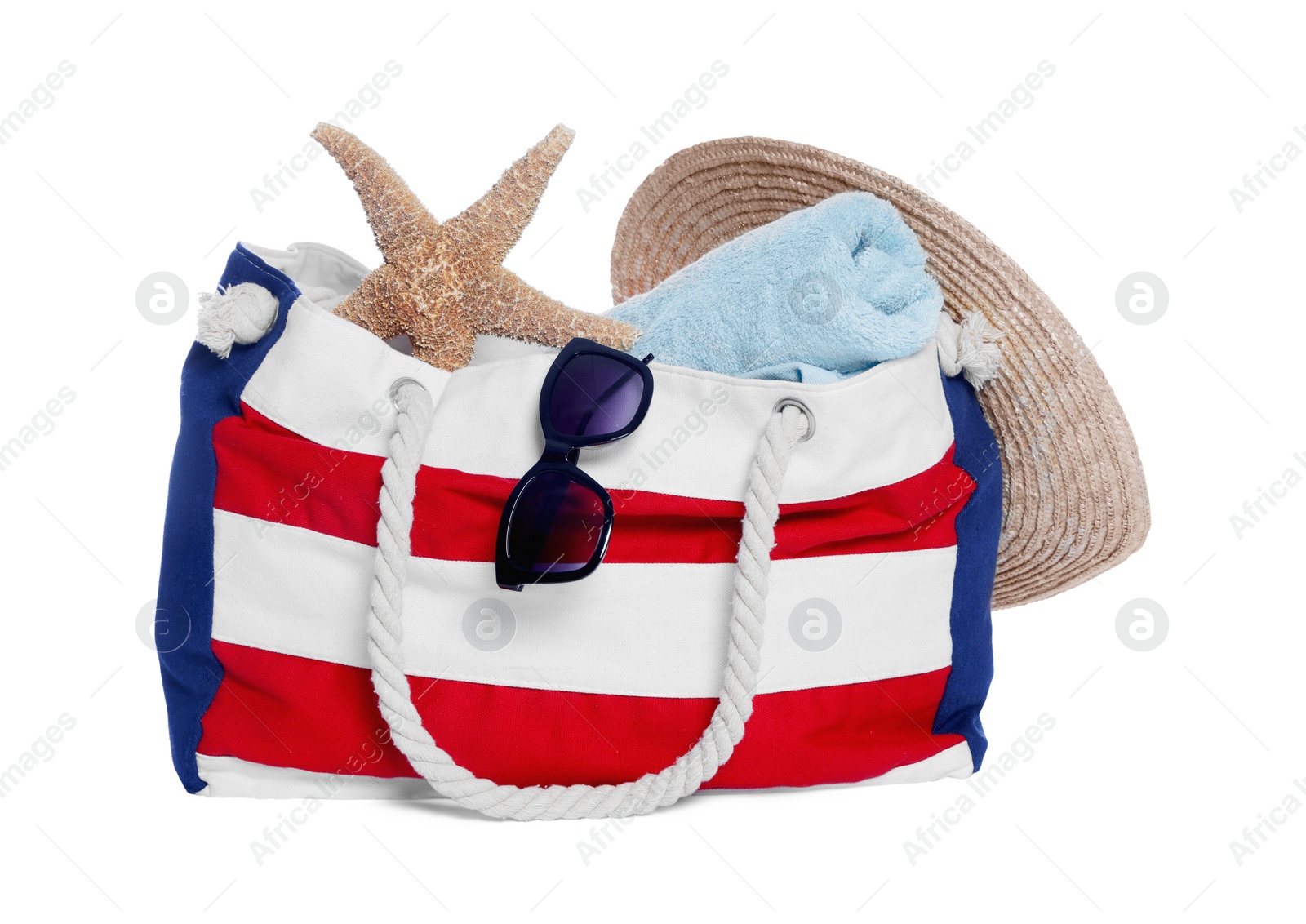 Photo of Stylish bag, starfish and other beach accessories isolated on white