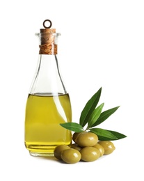 Photo of Glass bottle with fresh olive oil on white background