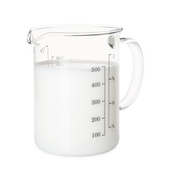Fresh milk in measuring cup isolated on white