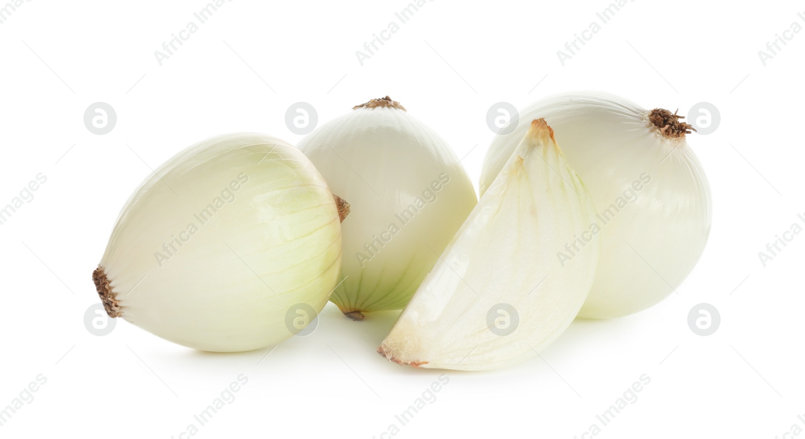 Photo of Fresh peeled onion bulbs on white background