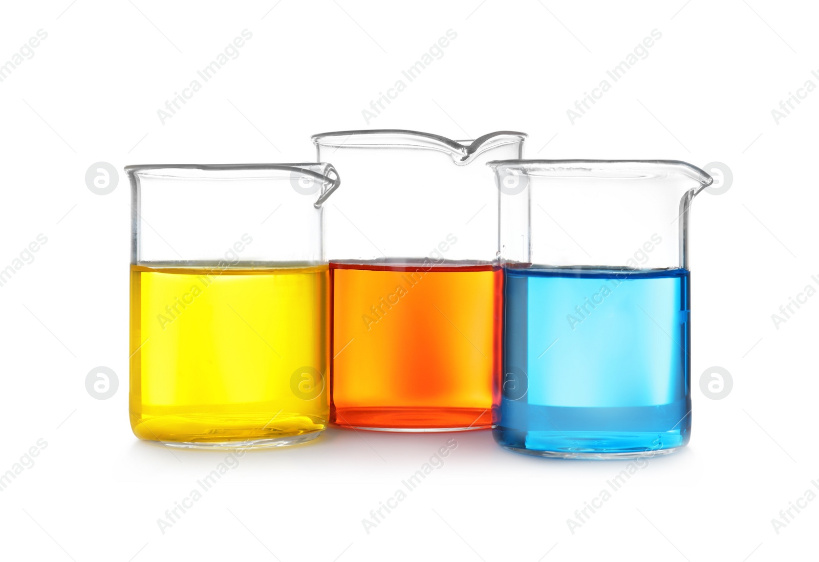 Photo of Laboratory glassware with color liquids on white background