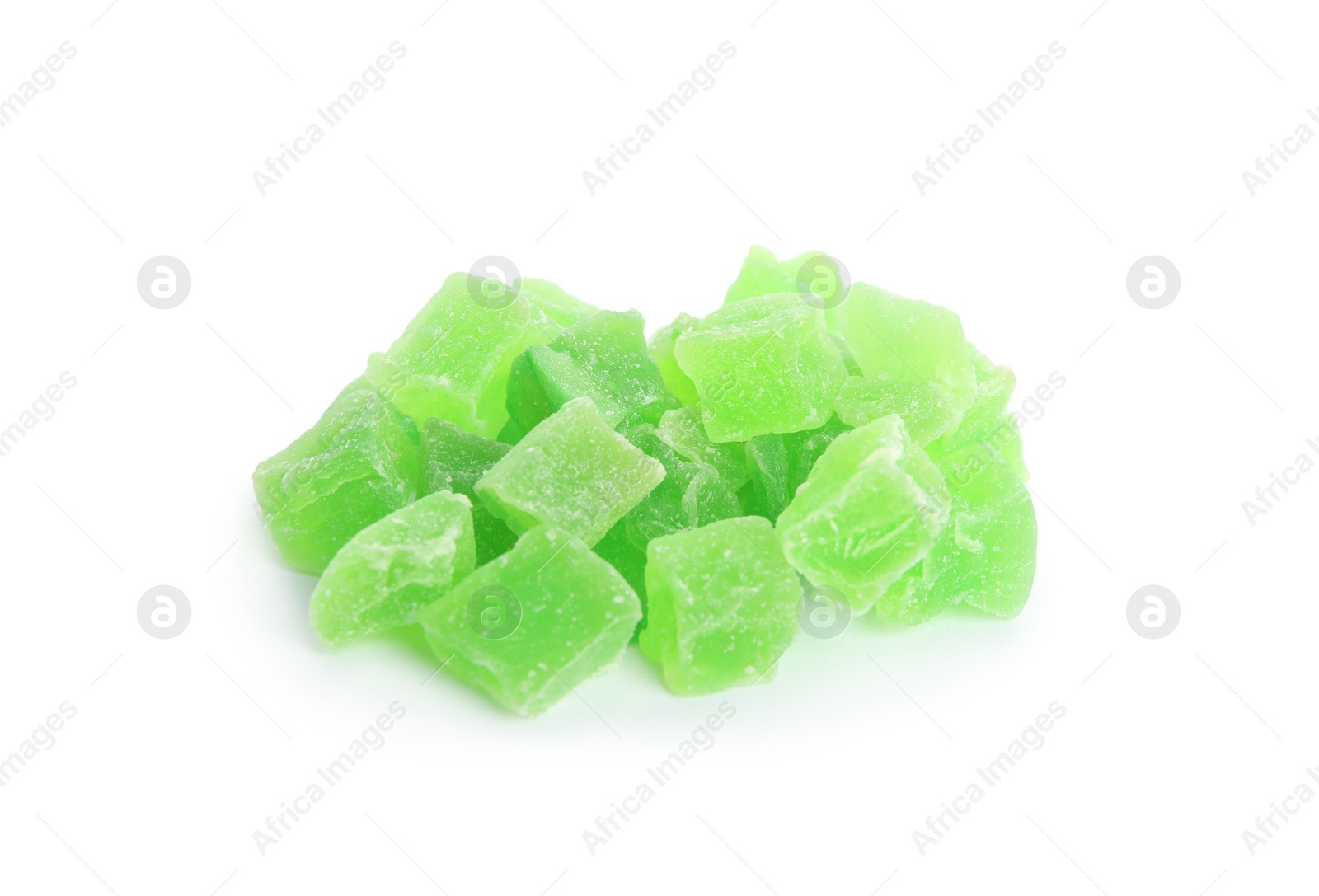 Photo of Delicious green candied fruit pieces on white background