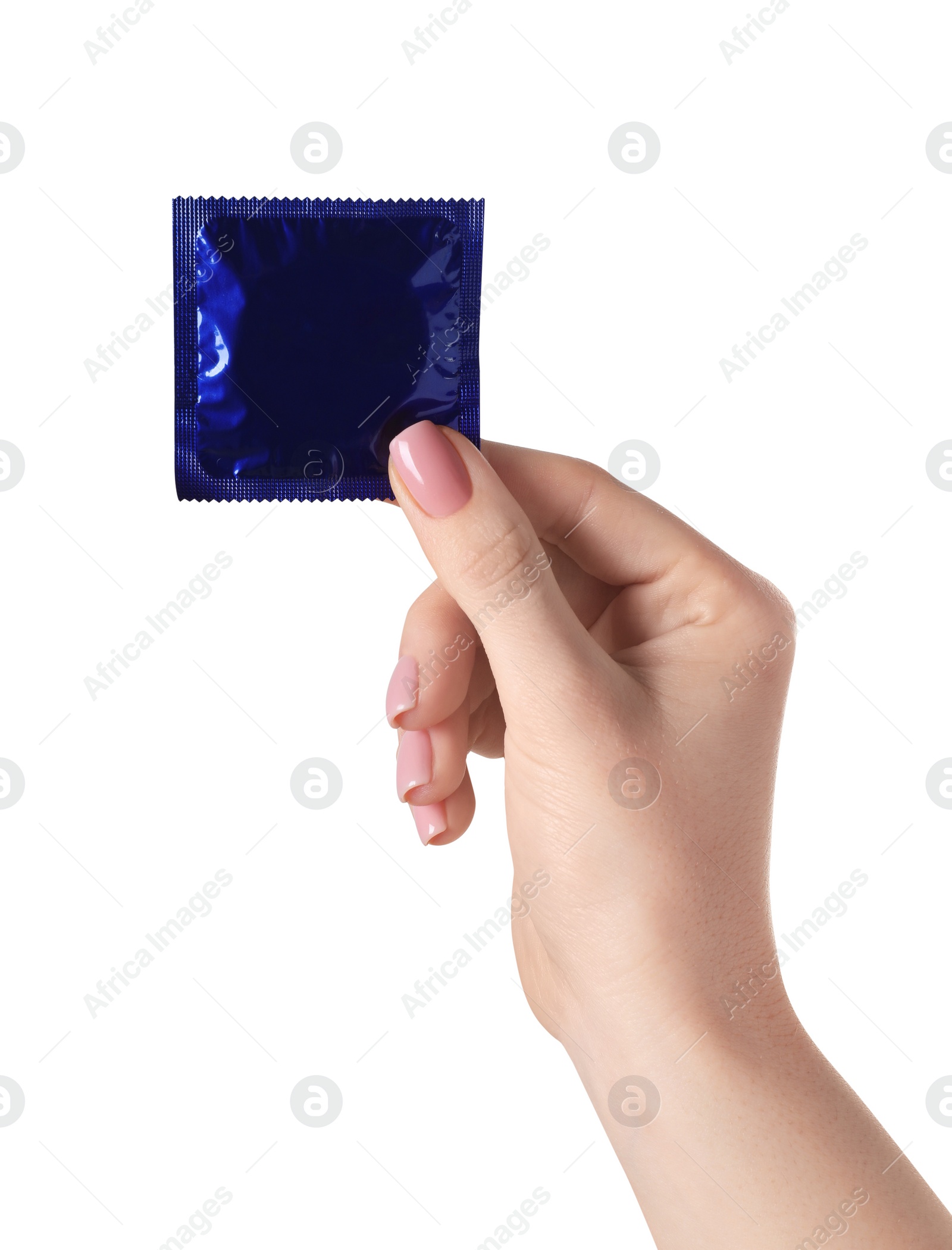 Photo of Woman holding condom on white background, closeup