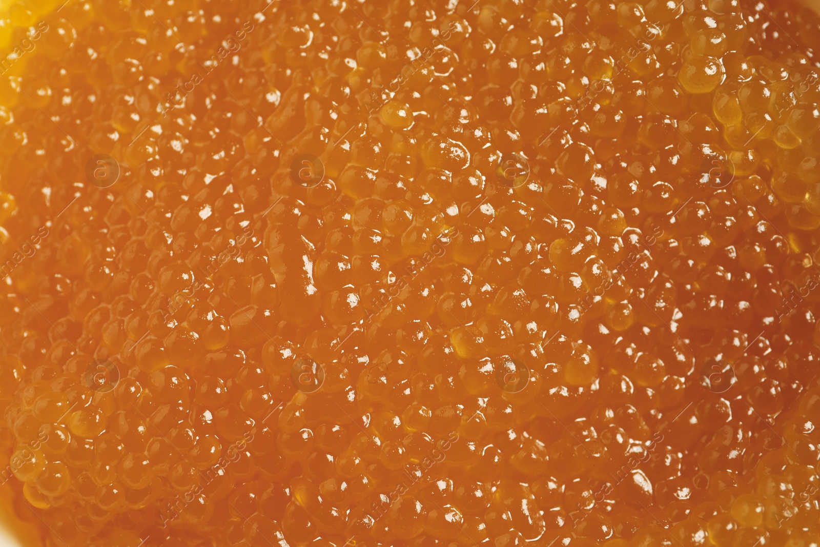 Photo of Fresh pike caviar as background, top view