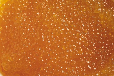 Photo of Fresh pike caviar as background, top view
