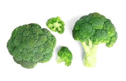 Photo of Fresh green broccoli on white background, top view. Organic food