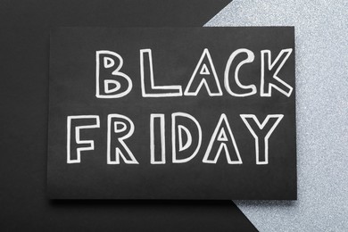 Photo of Card with words Black Friday on color background, top view