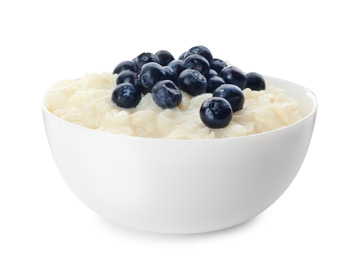 Photo of Delicious rice pudding with blueberries isolated on white