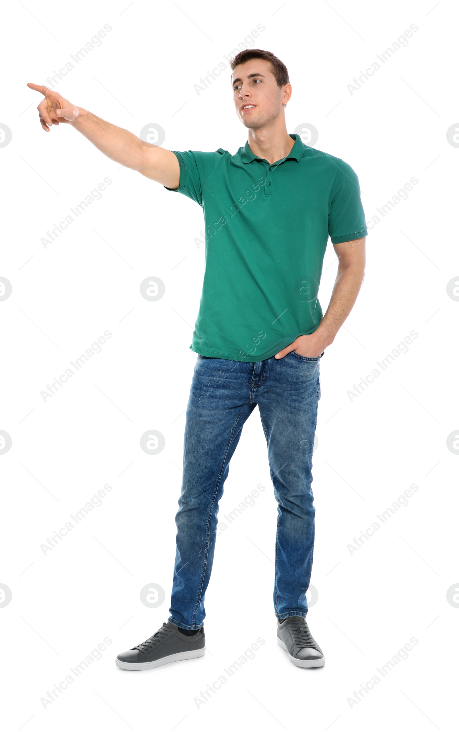 Photo of Full length portrait of young man in stylish clothes on white background