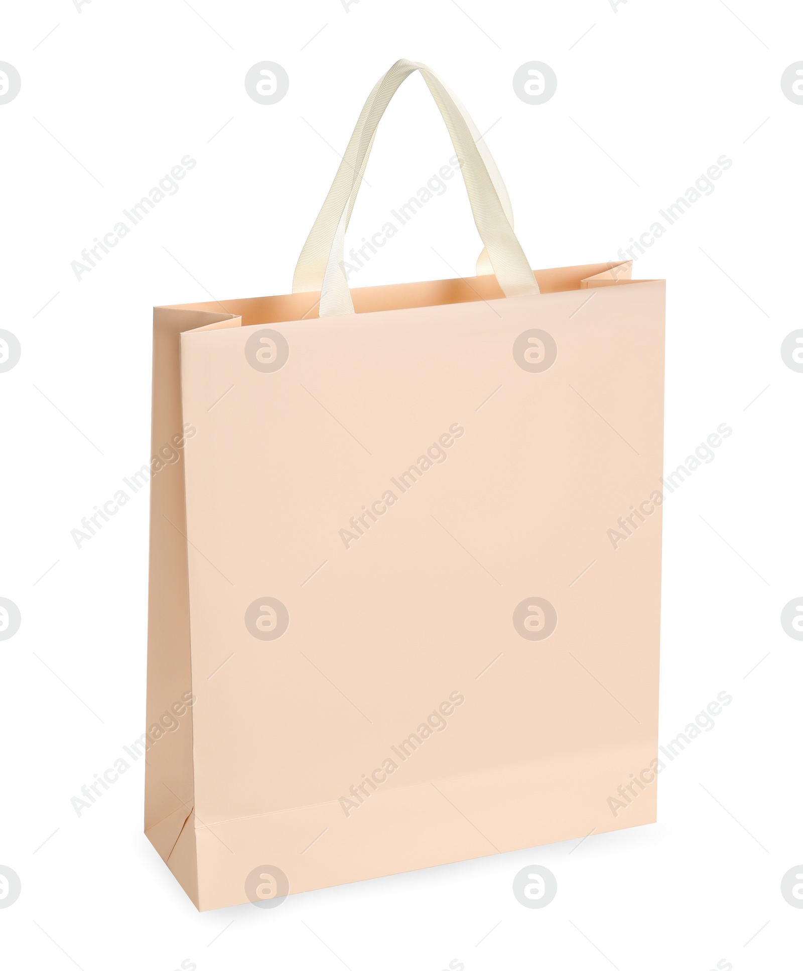 Photo of One paper bag isolated on white. Mockup for design