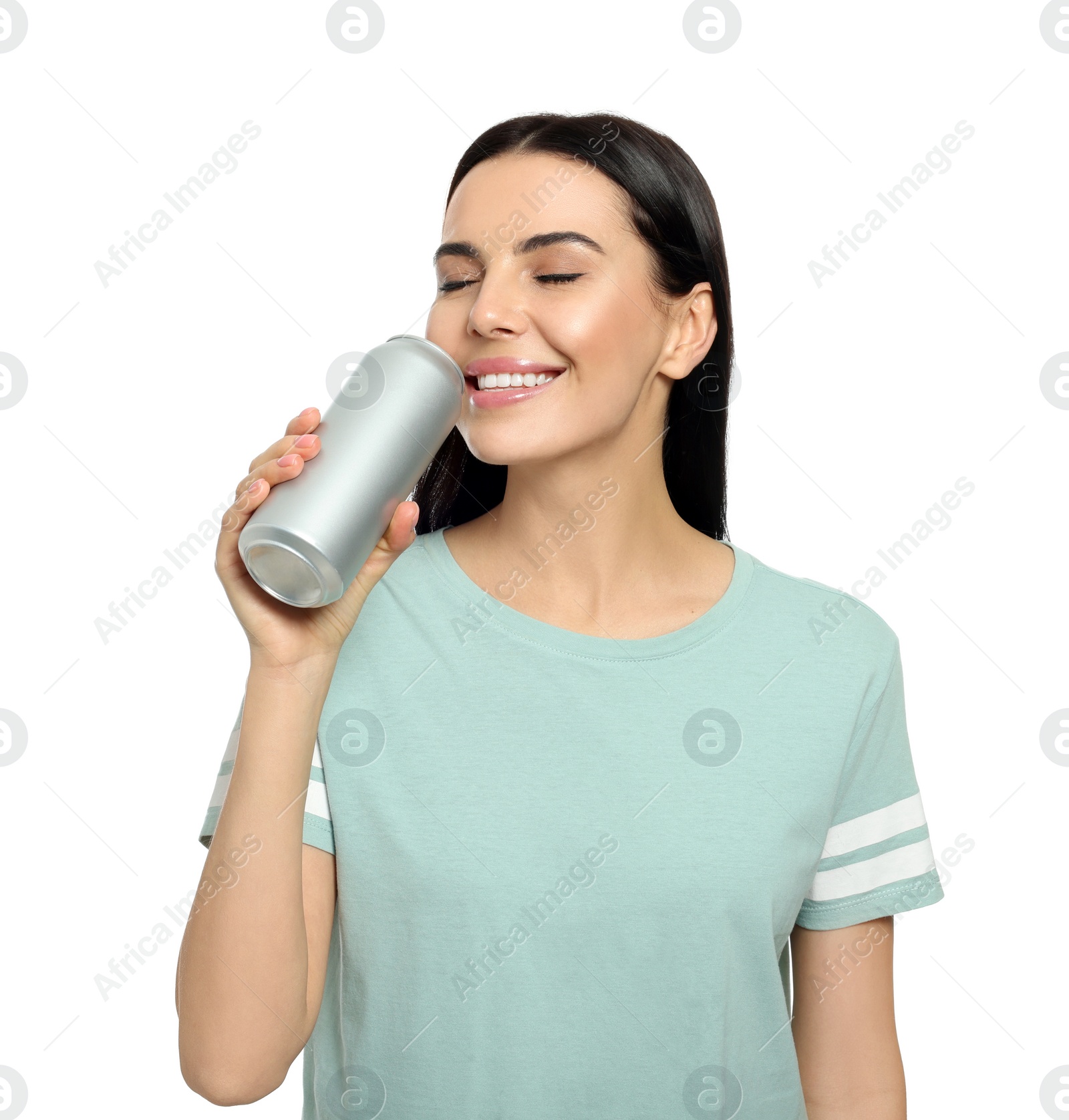 Photo of Beautiful happy woman drinking from beverage can on white background