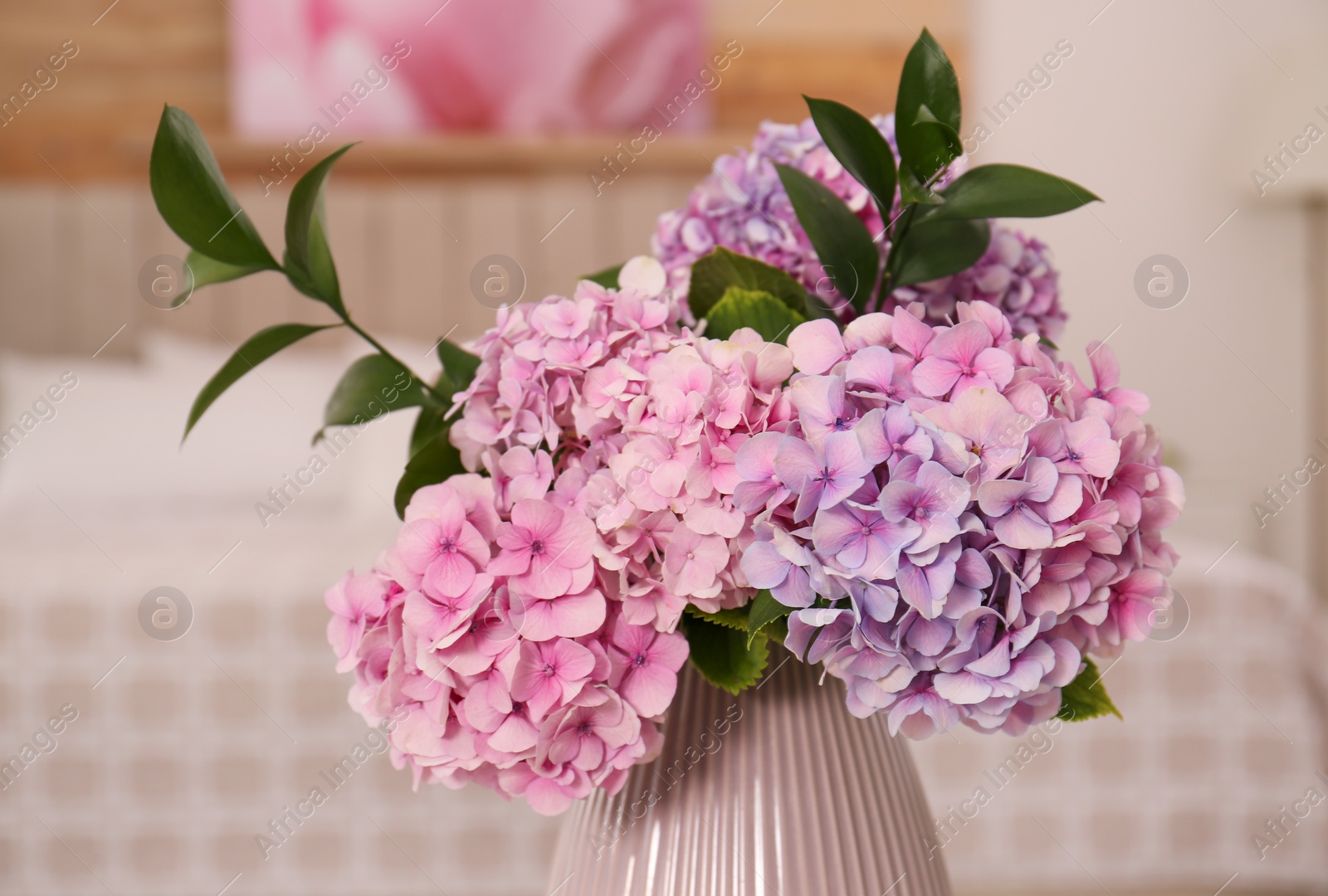 Photo of Bouquet of beautiful hydrangea flowers indoors, closeup. Interior design