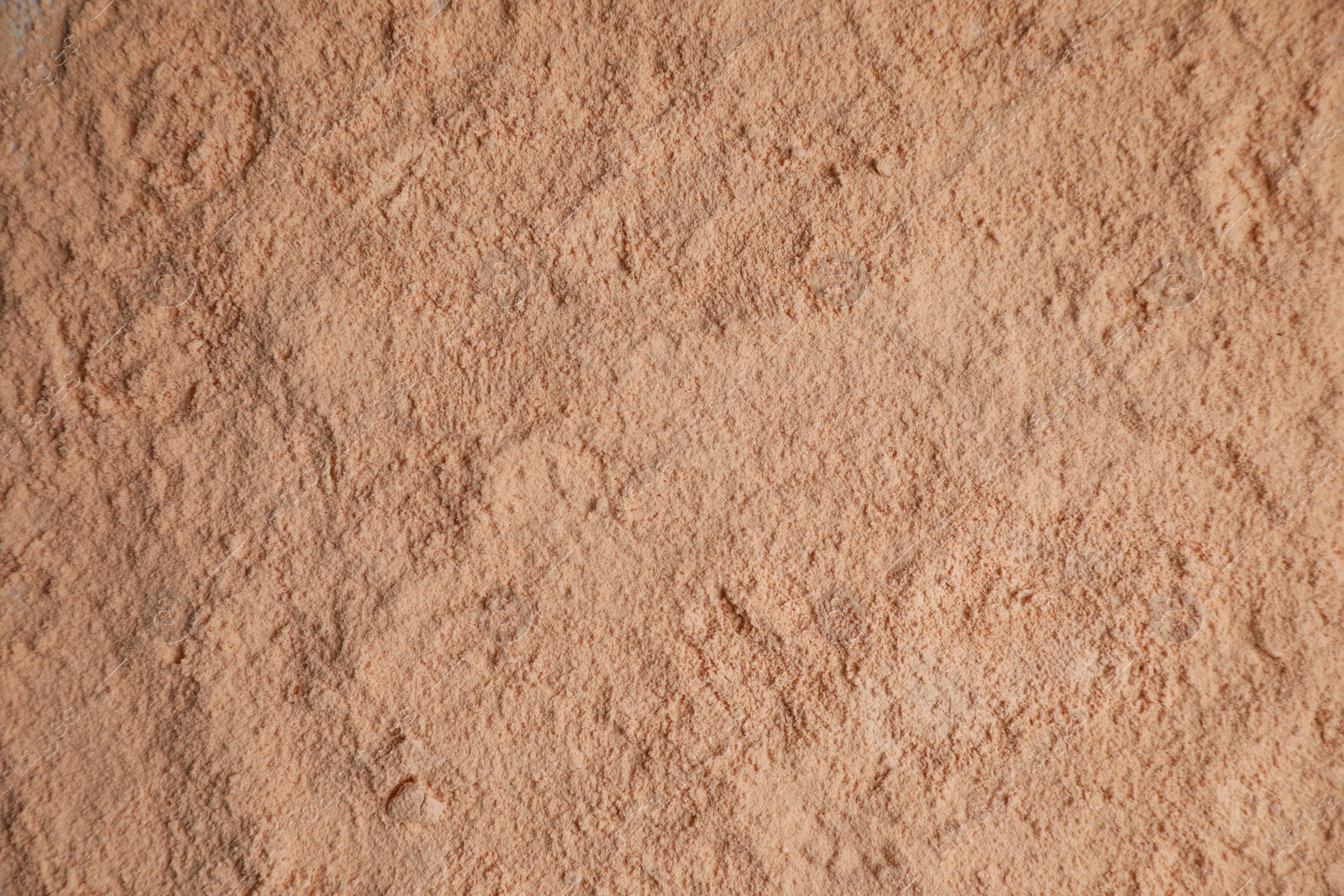 Photo of Loose face powder as background, top view