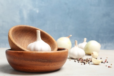 Photo of Composition with garlic bulb on table. Space for text
