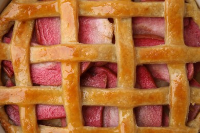 Photo of Delicious pie with apples as background, top view