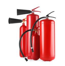 Photo of Many red fire extinguishers on white background