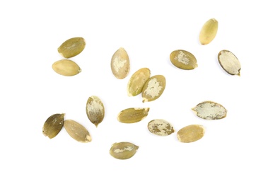 Photo of Raw peeled pumpkin seeds on white background, top view