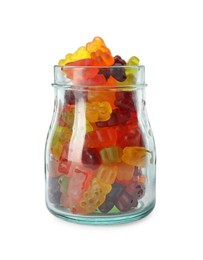 Delicious gummy bear candies in glass jar on white background