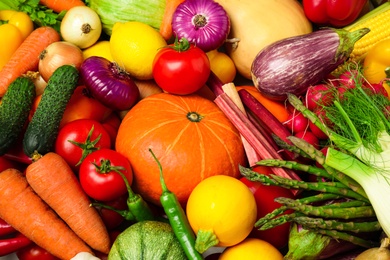 Photo of Many fresh vegetables as background, closeup view