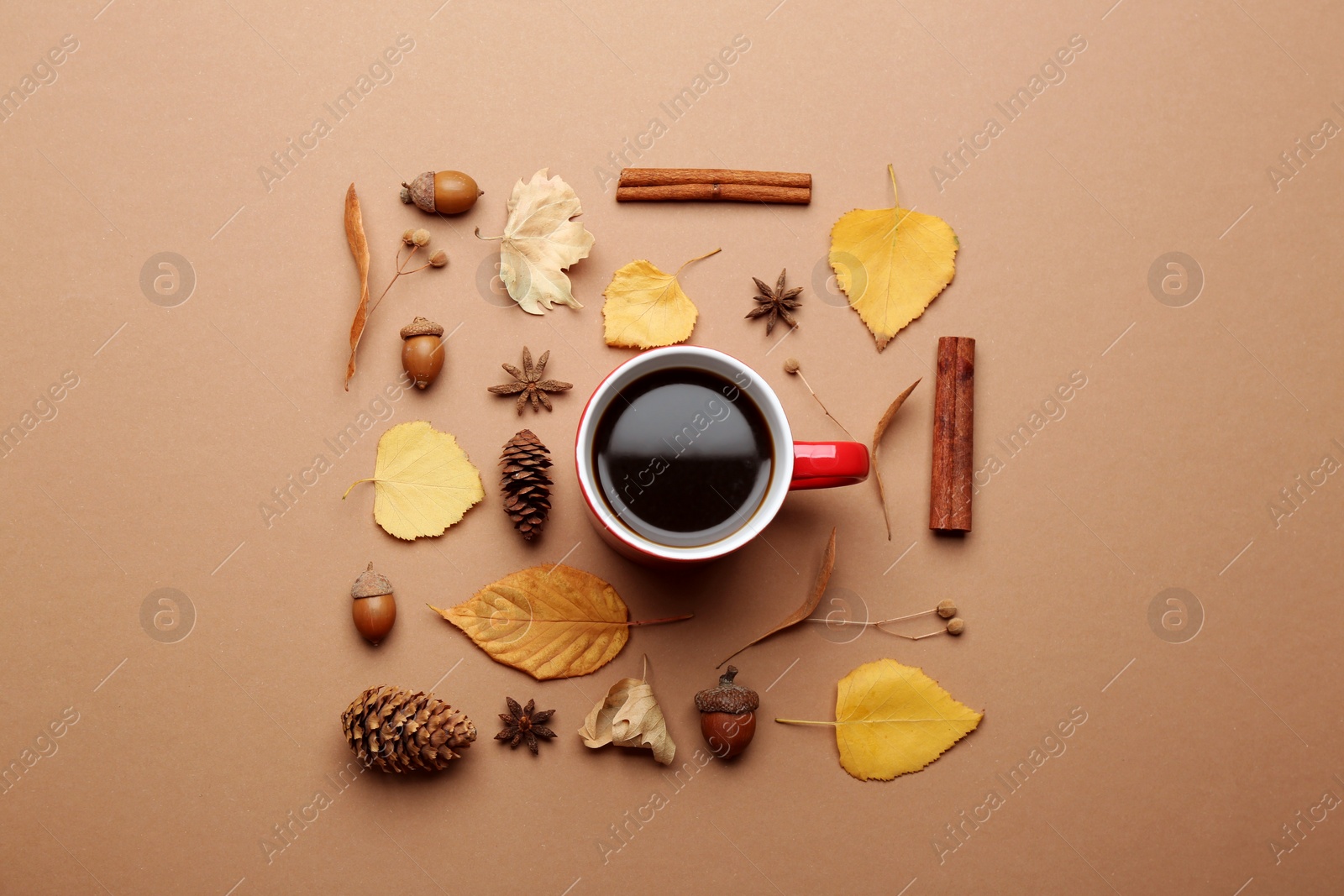 Photo of Flat lay composition with hot drink on beige background. Cozy autumn