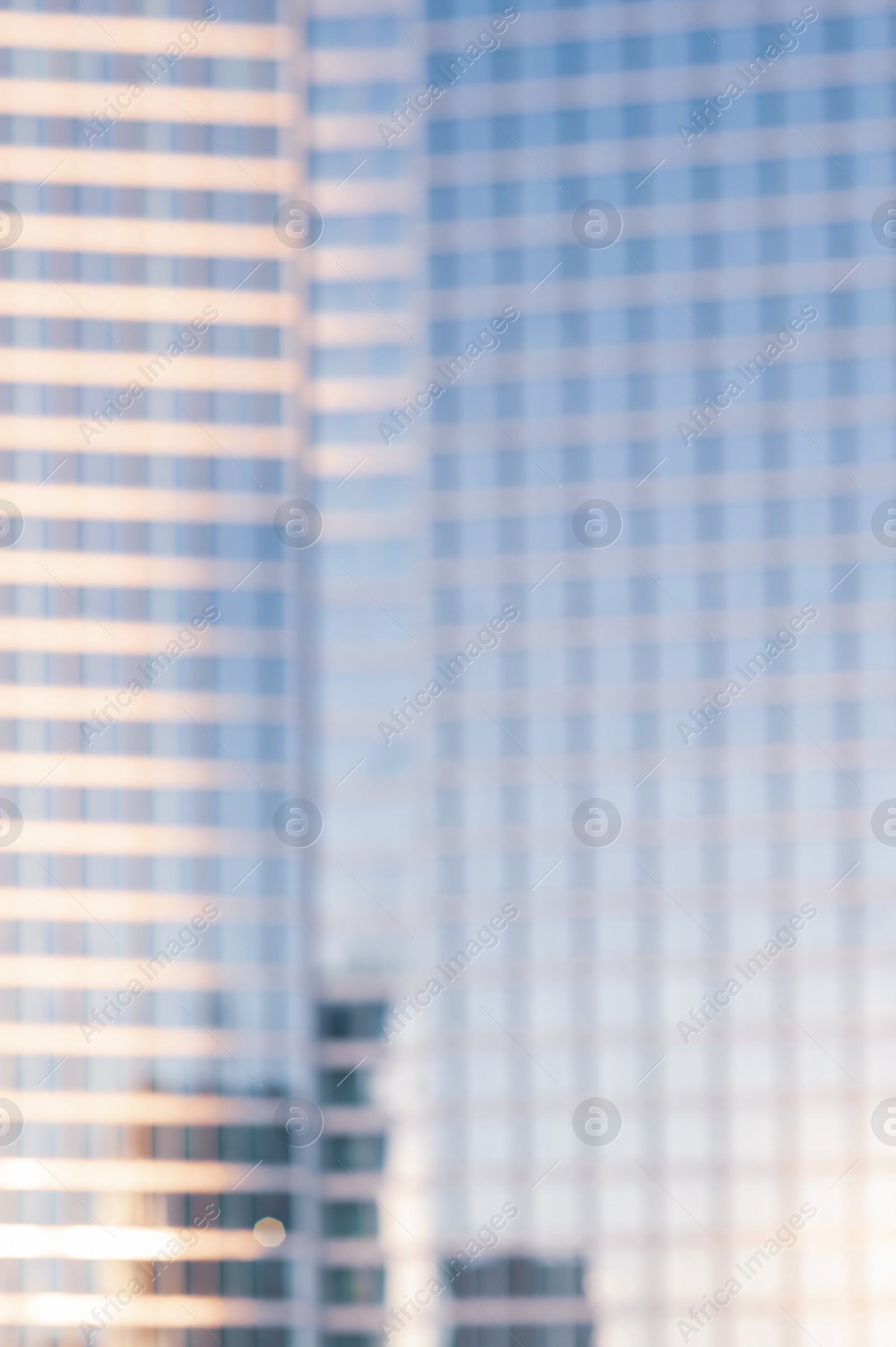 Photo of Blurred view of modern building on sunny day