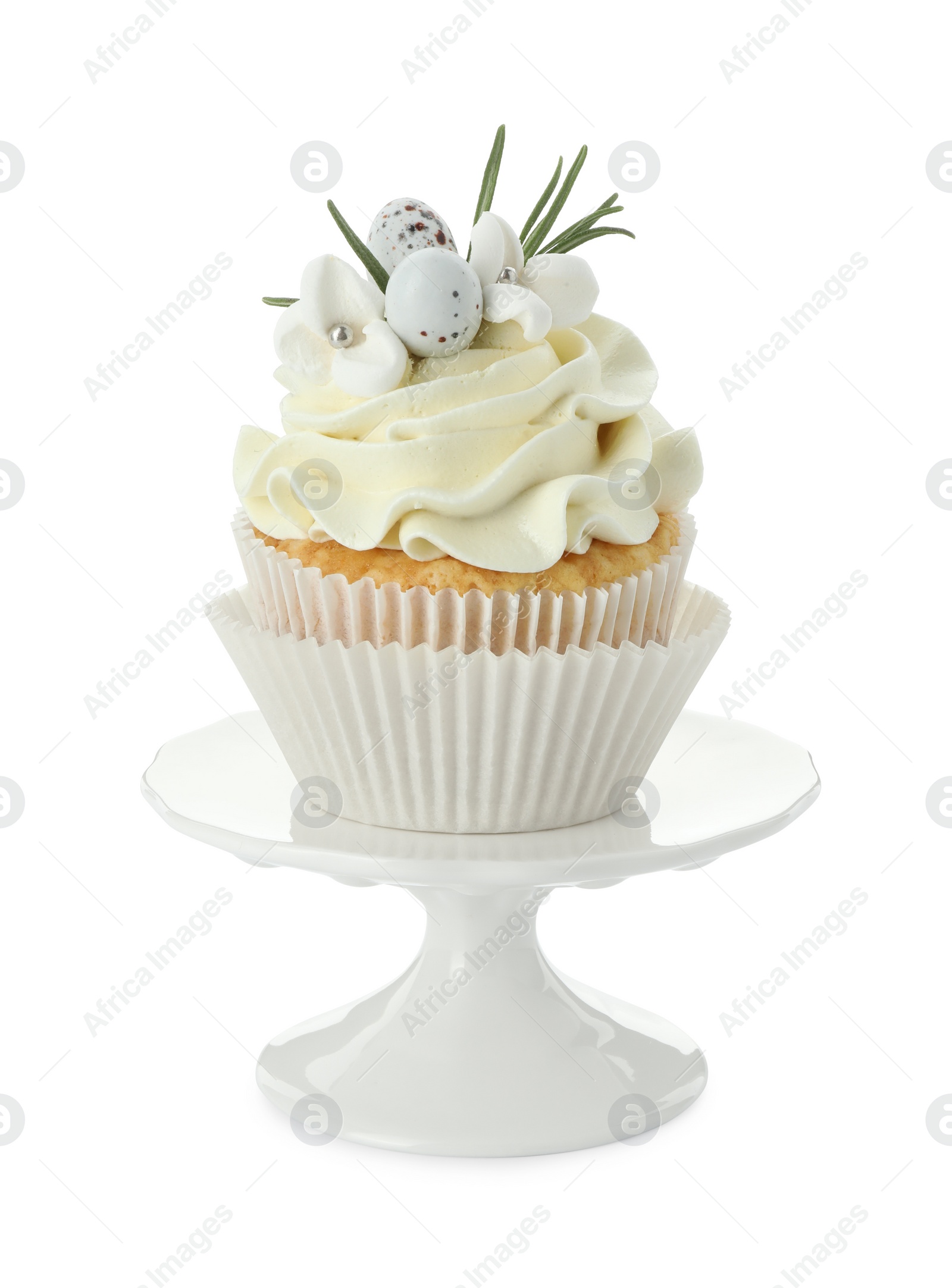 Photo of Tasty Easter cupcake with vanilla cream isolated on white