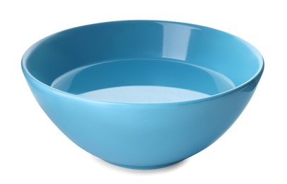 Photo of Blue ceramic bowl with clear water isolated on white