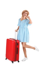 Photo of Woman with suitcase on white background. Vacation travel