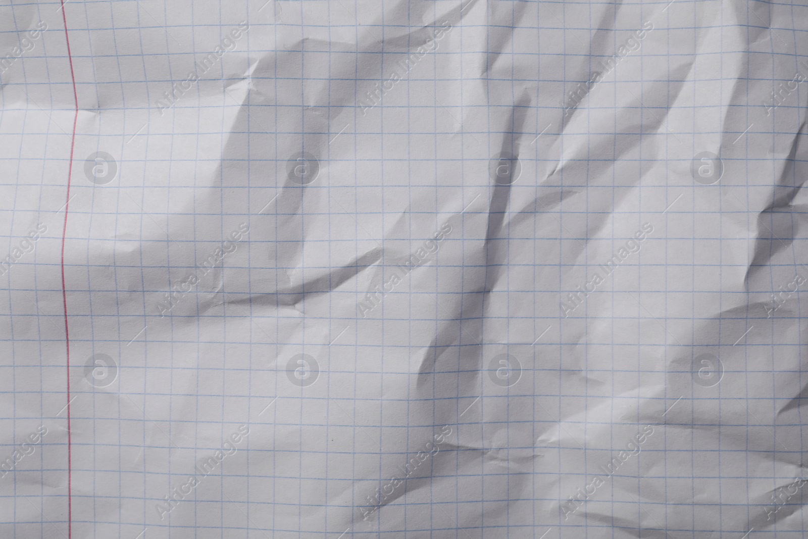 Photo of Crumpled sheet of paper as background, top view