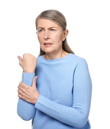 Photo of Arthritis symptoms. Woman suffering from pain in arm on white background