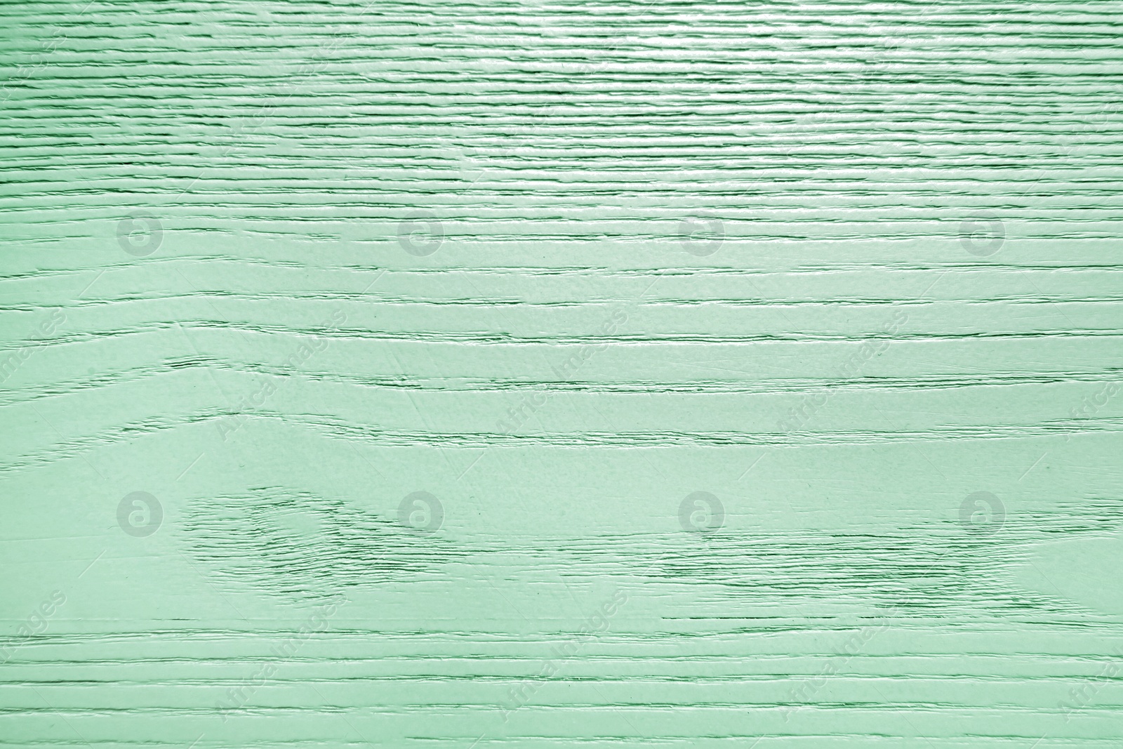 Image of Texture of wooden surface as background. Image toned in mint color 