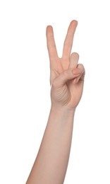 Playing rock, paper and scissors. Woman making scissors with her fingers on white background, closeup