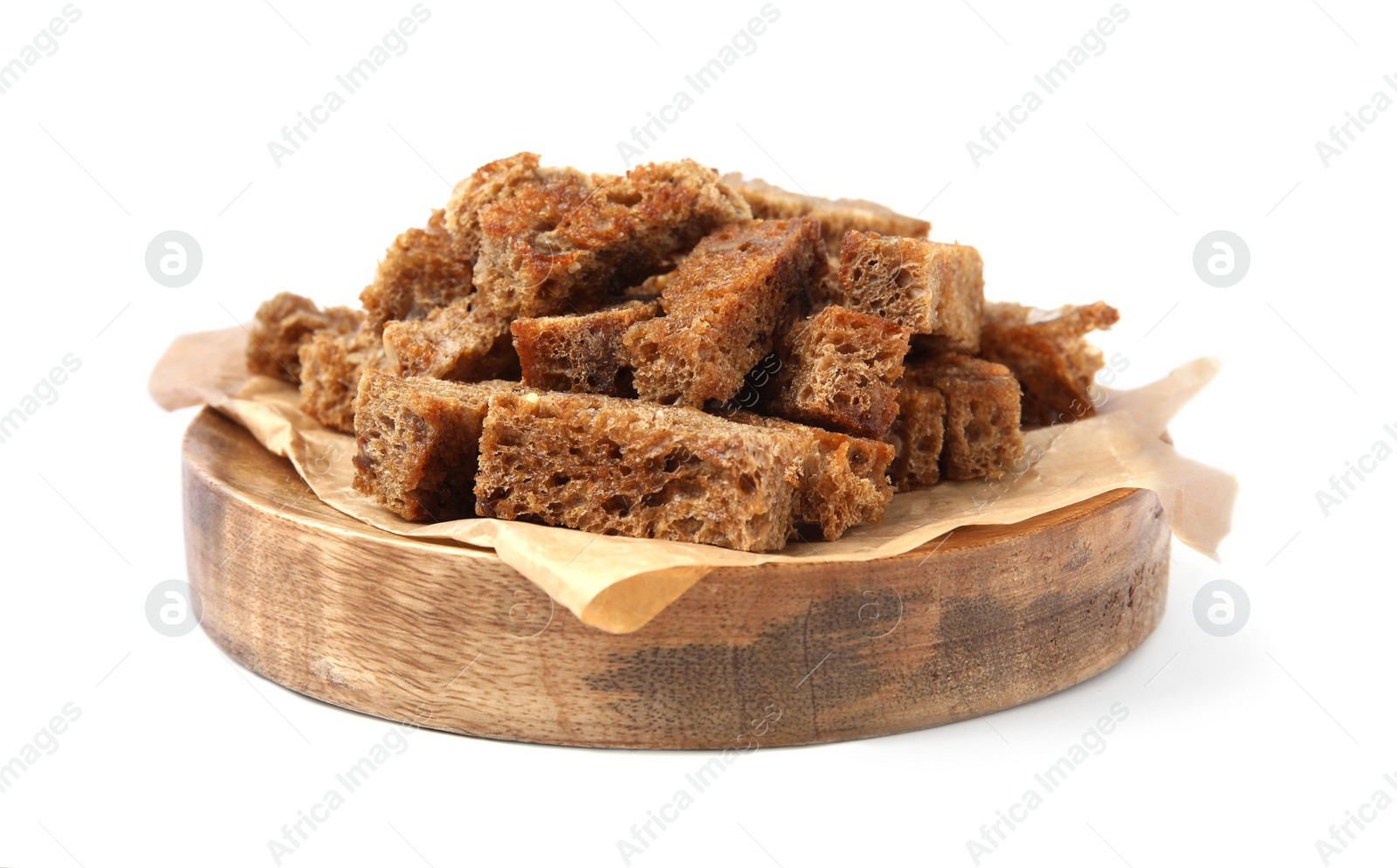 Photo of Wooden tray with crispy rusks isolated on white