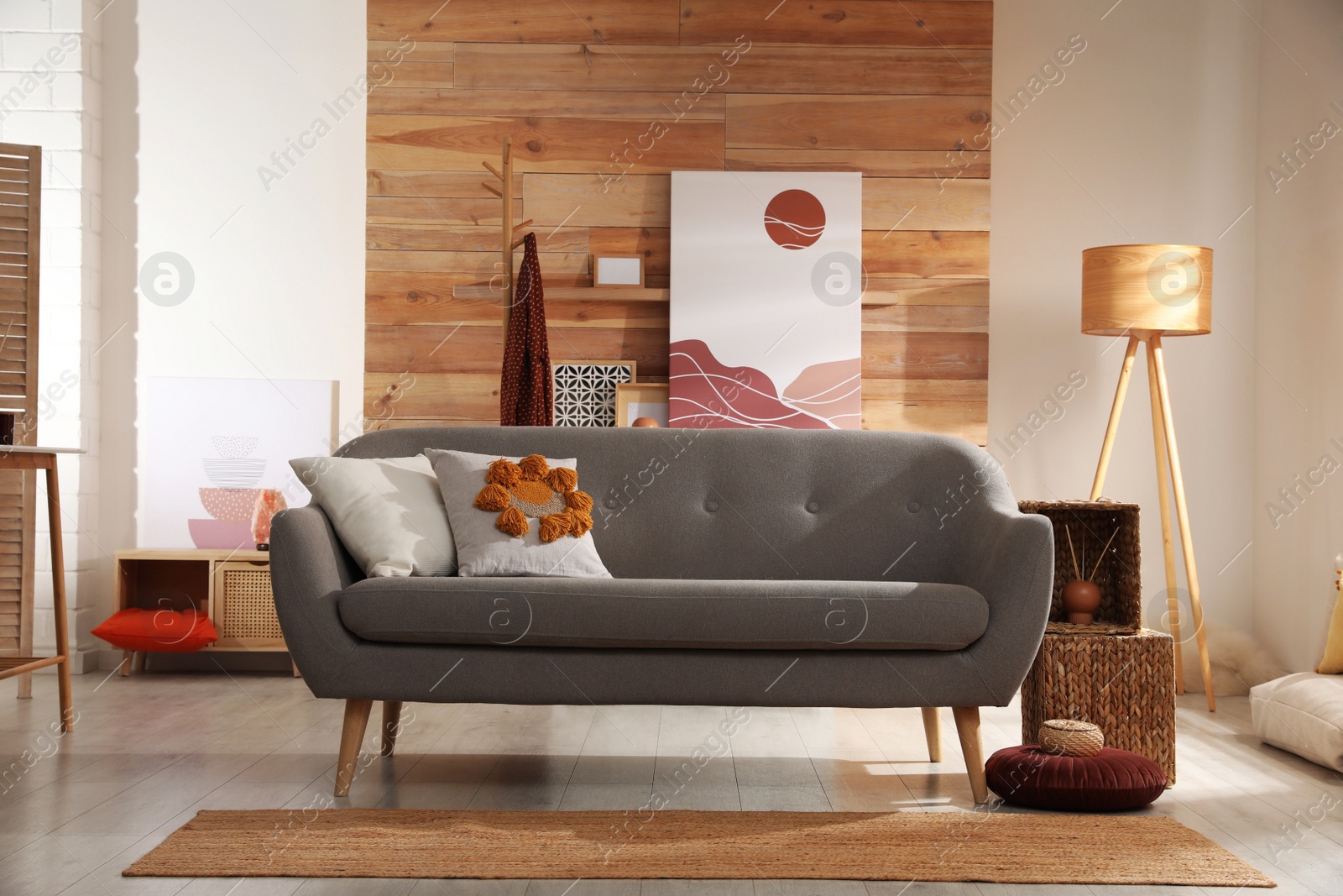 Photo of Comfortable sofa in stylish living room. Interior design